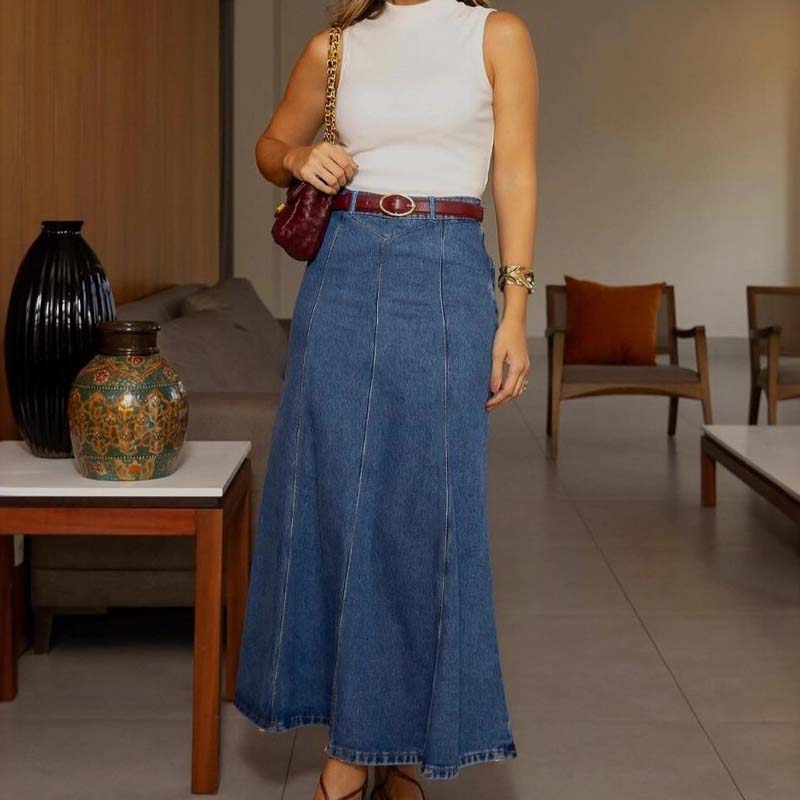 Blue high-waist maxi skirt with a clean structured waistband and flowing length