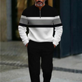 Men's black 2-piece leisure set with zip collar top and matching stripe trousers