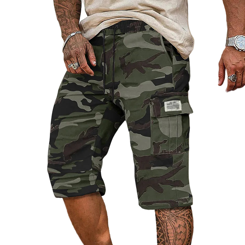 Men's olive cargo shorts with multiple side pockets and a relaxed urban fit