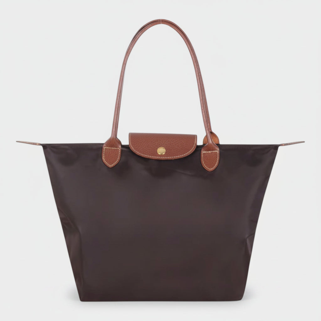 Classic structured tote bag in navy with contrast handles, shown in multiple colours