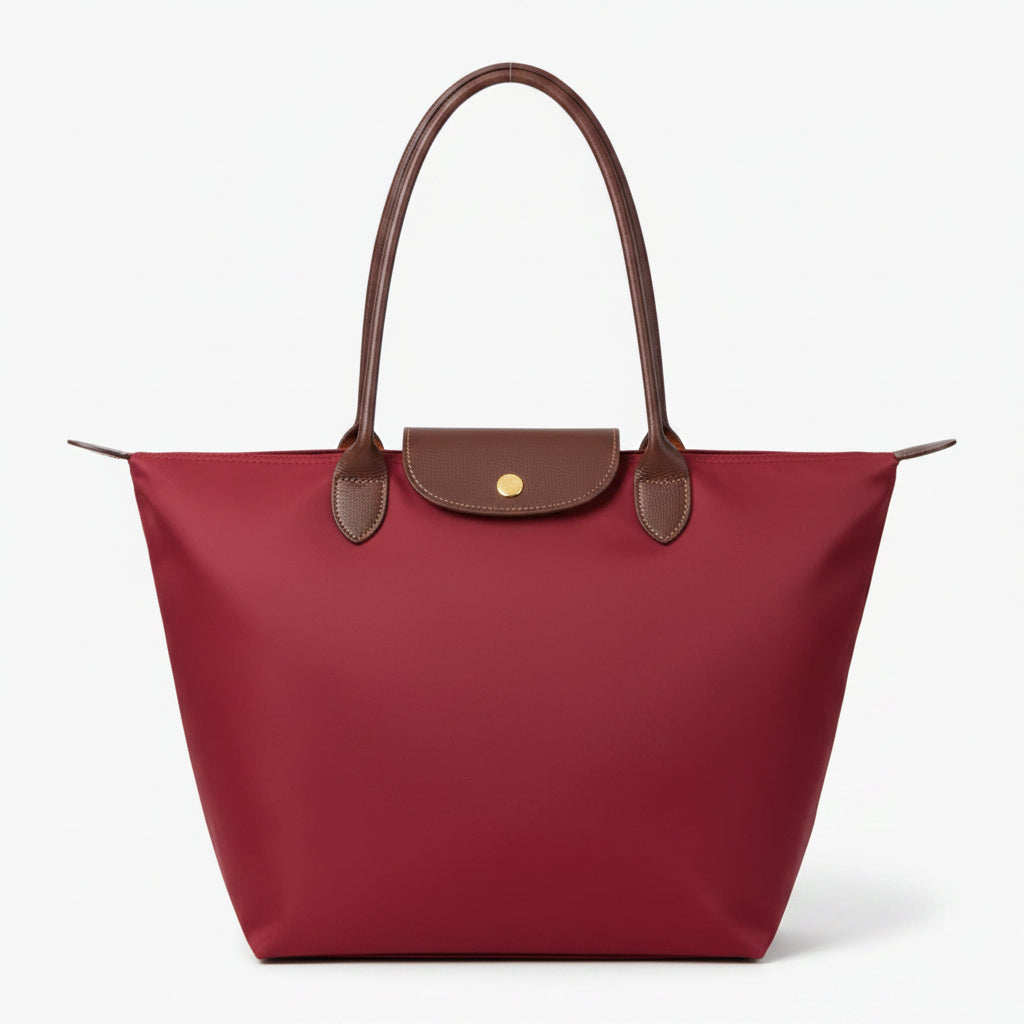 Classic structured tote bag in navy with contrast handles, shown in multiple colours