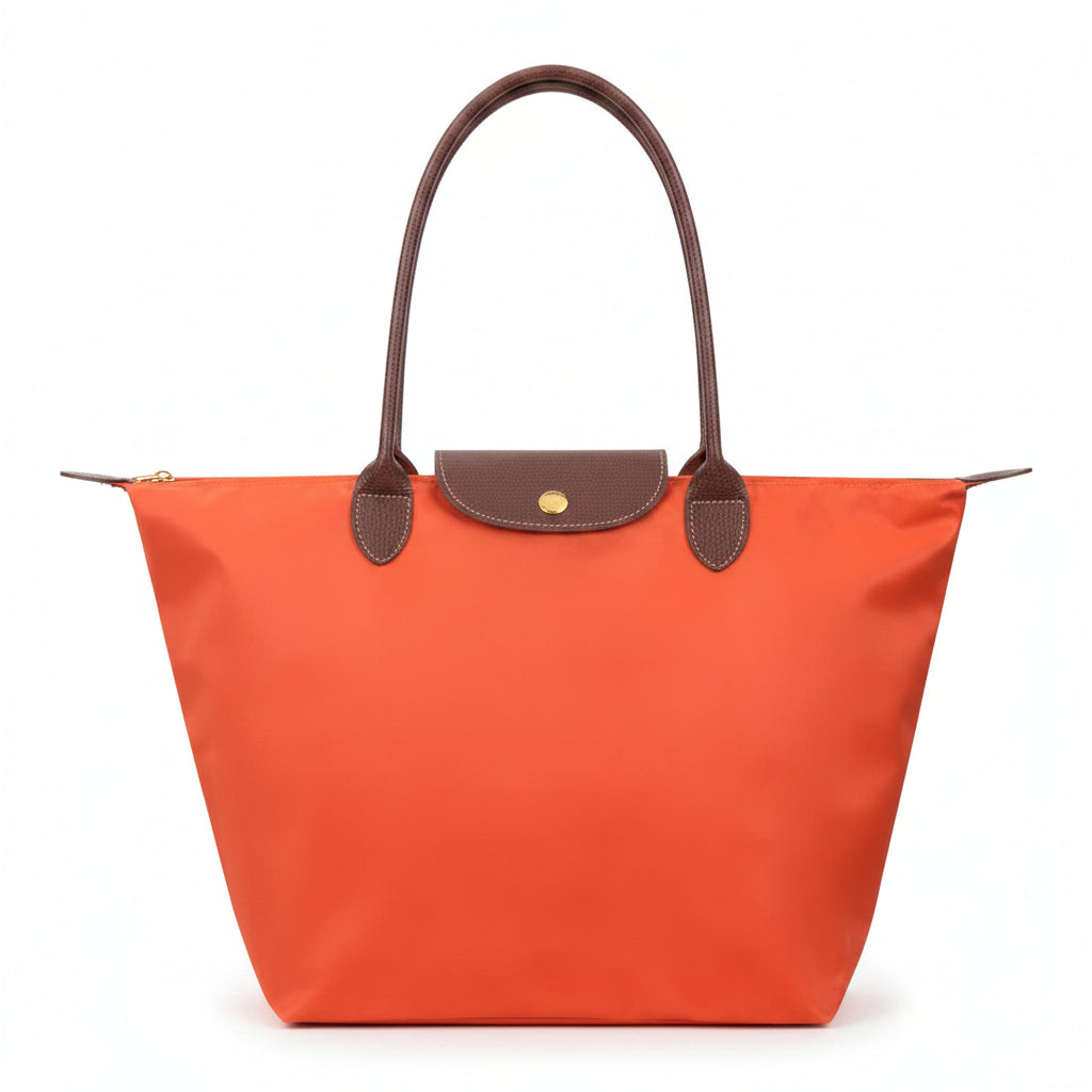Classic structured tote bag in navy with contrast handles, shown in multiple colours