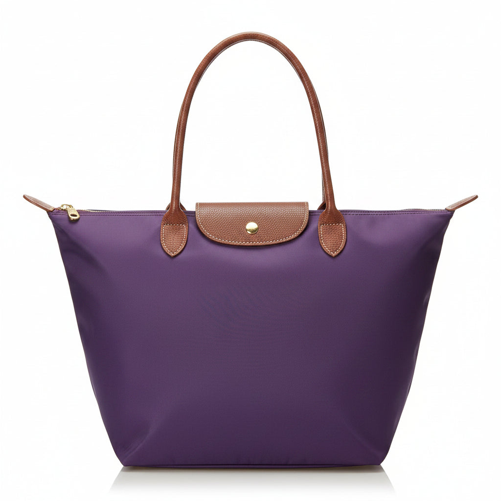 Classic structured tote bag in navy with contrast handles, shown in multiple colours