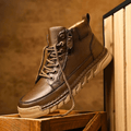 Men's signature polished boots in brown and black with a clean, classic silhouette