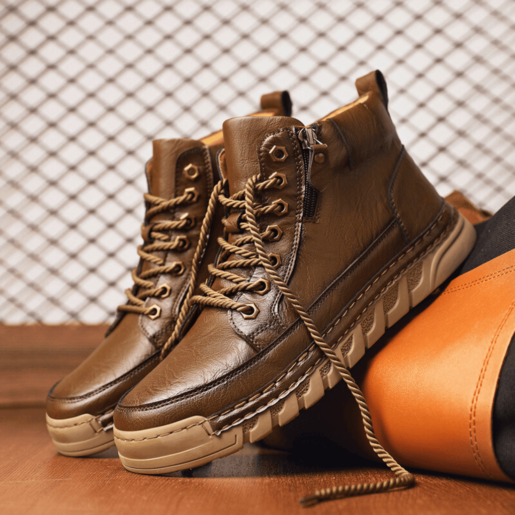 Men's signature polished boots in brown and black with a clean, classic silhouette