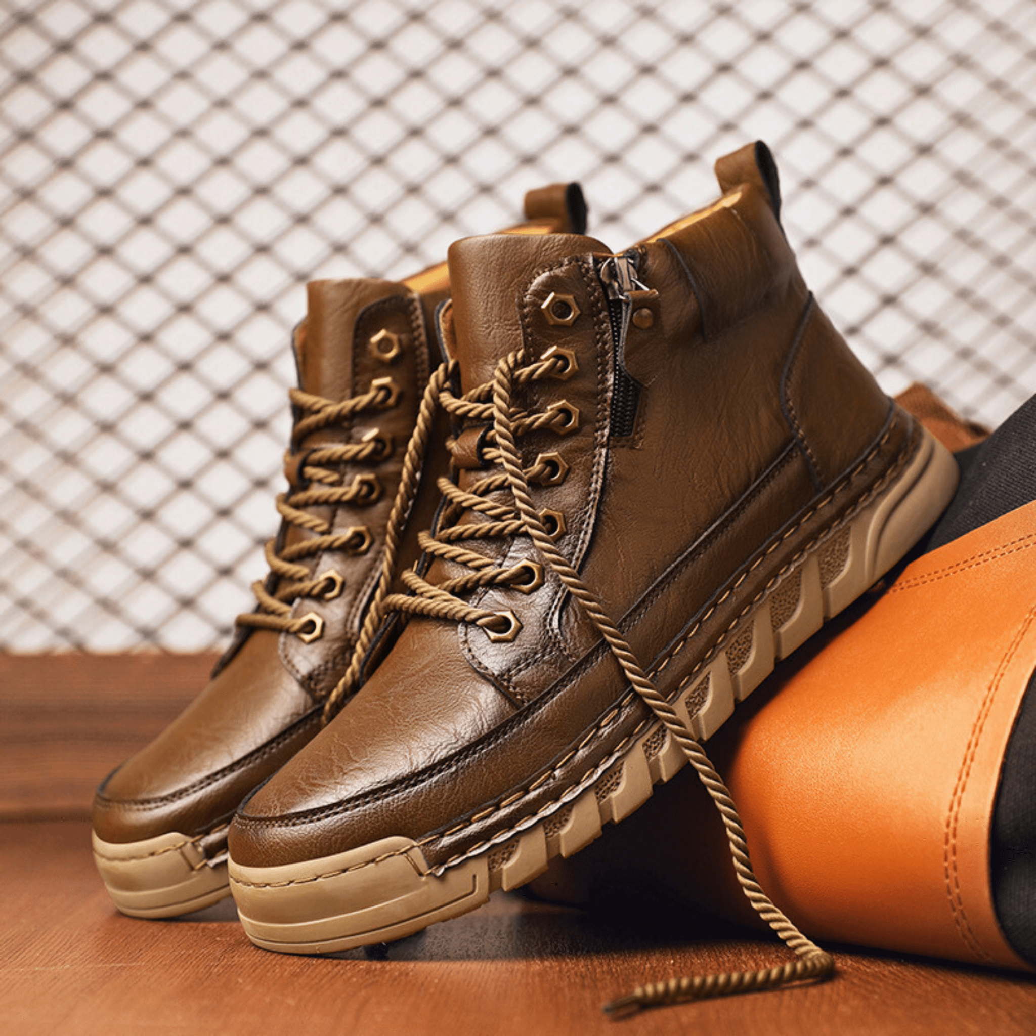 Men's signature polished boots in brown and black with a clean, classic silhouette