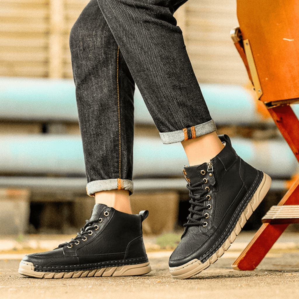 Men's signature polished boots in brown and black with a clean, classic silhouette