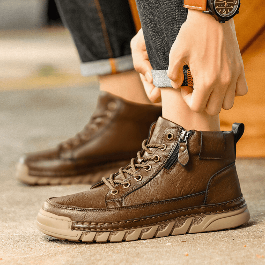 Men's signature polished boots in brown and black with a clean, classic silhouette