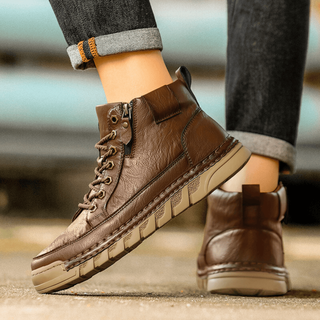 Men's signature polished boots in brown and black with a clean, classic silhouette