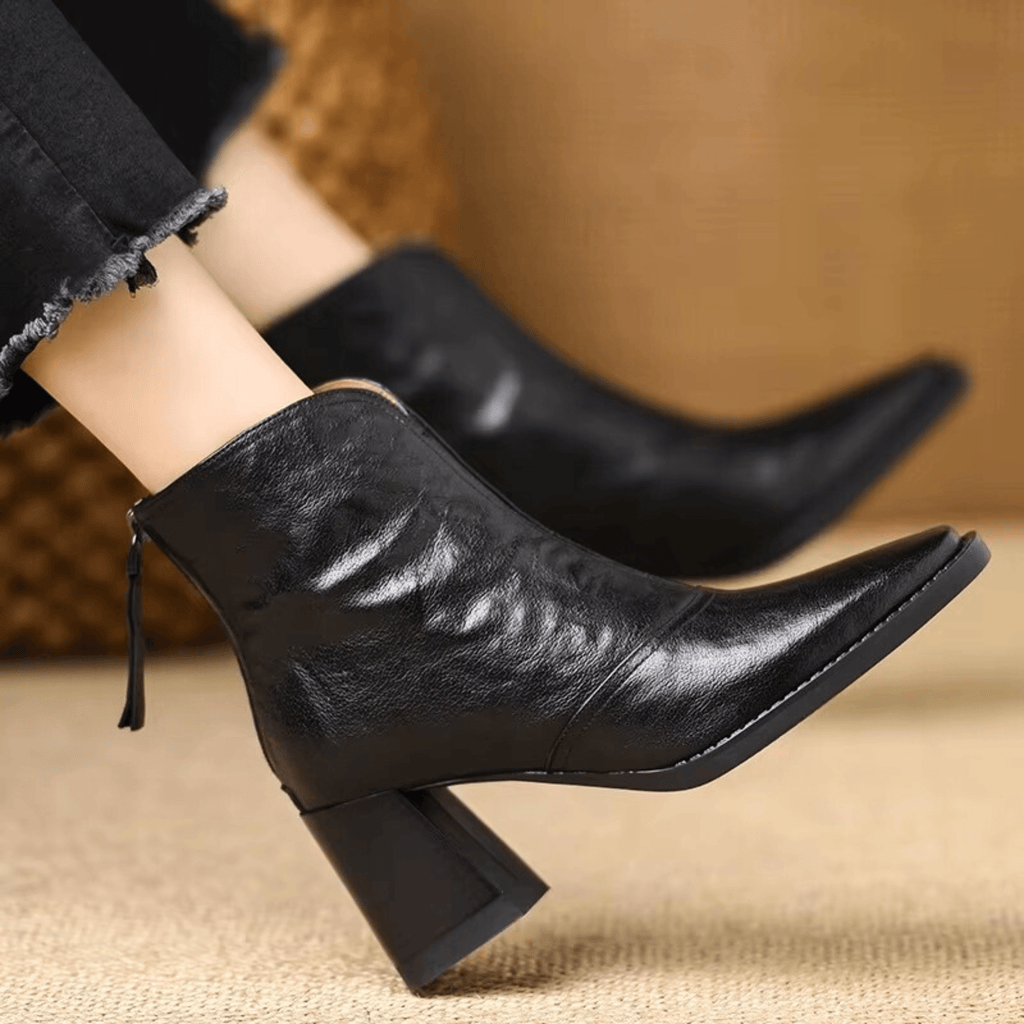 Sculpted heel ankle boots in espresso and midnight with a tailored ankle silhouette and back zip