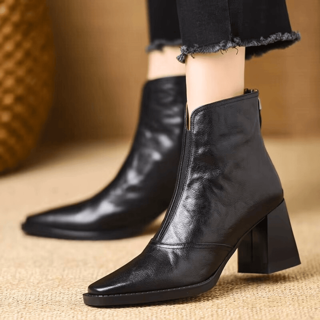 Sculpted heel ankle boots in espresso and midnight with a tailored ankle silhouette and back zip