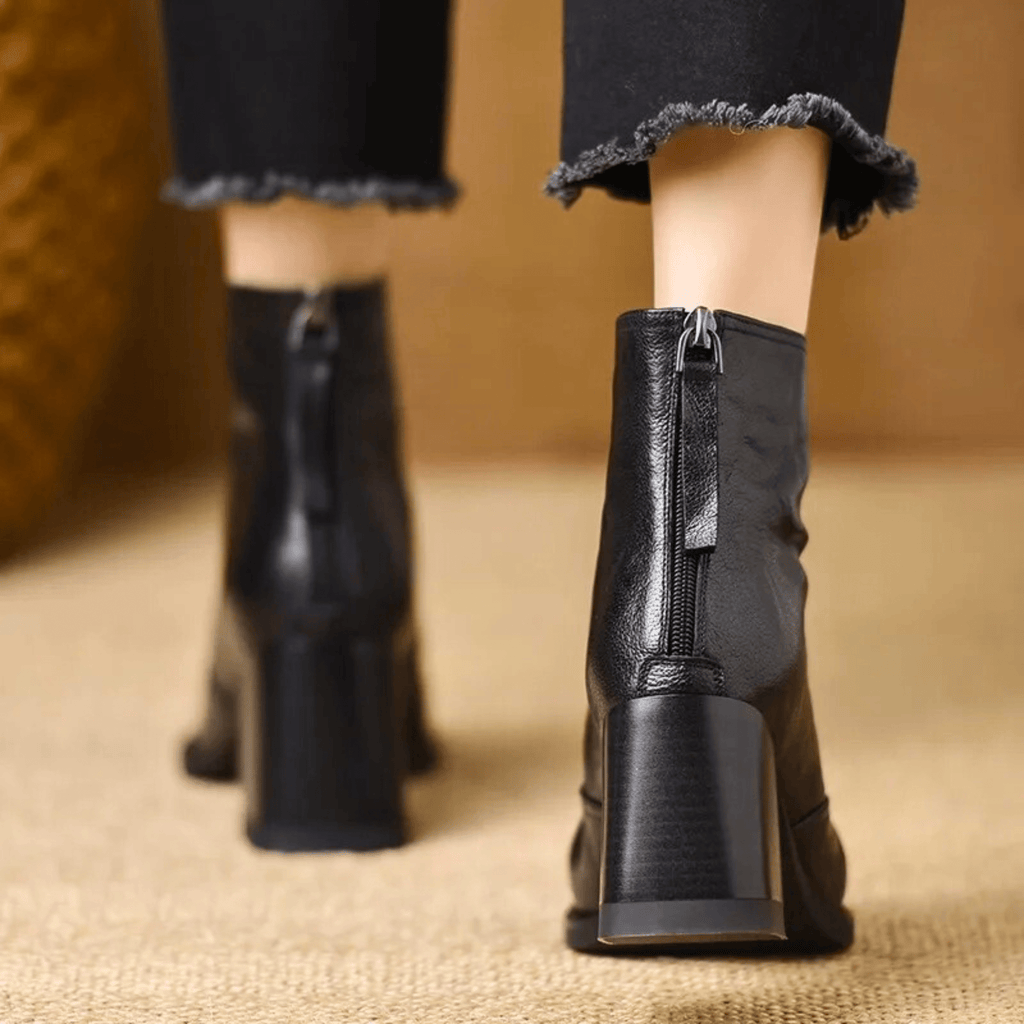 Sculpted heel ankle boots in espresso and midnight with a tailored ankle silhouette and back zip