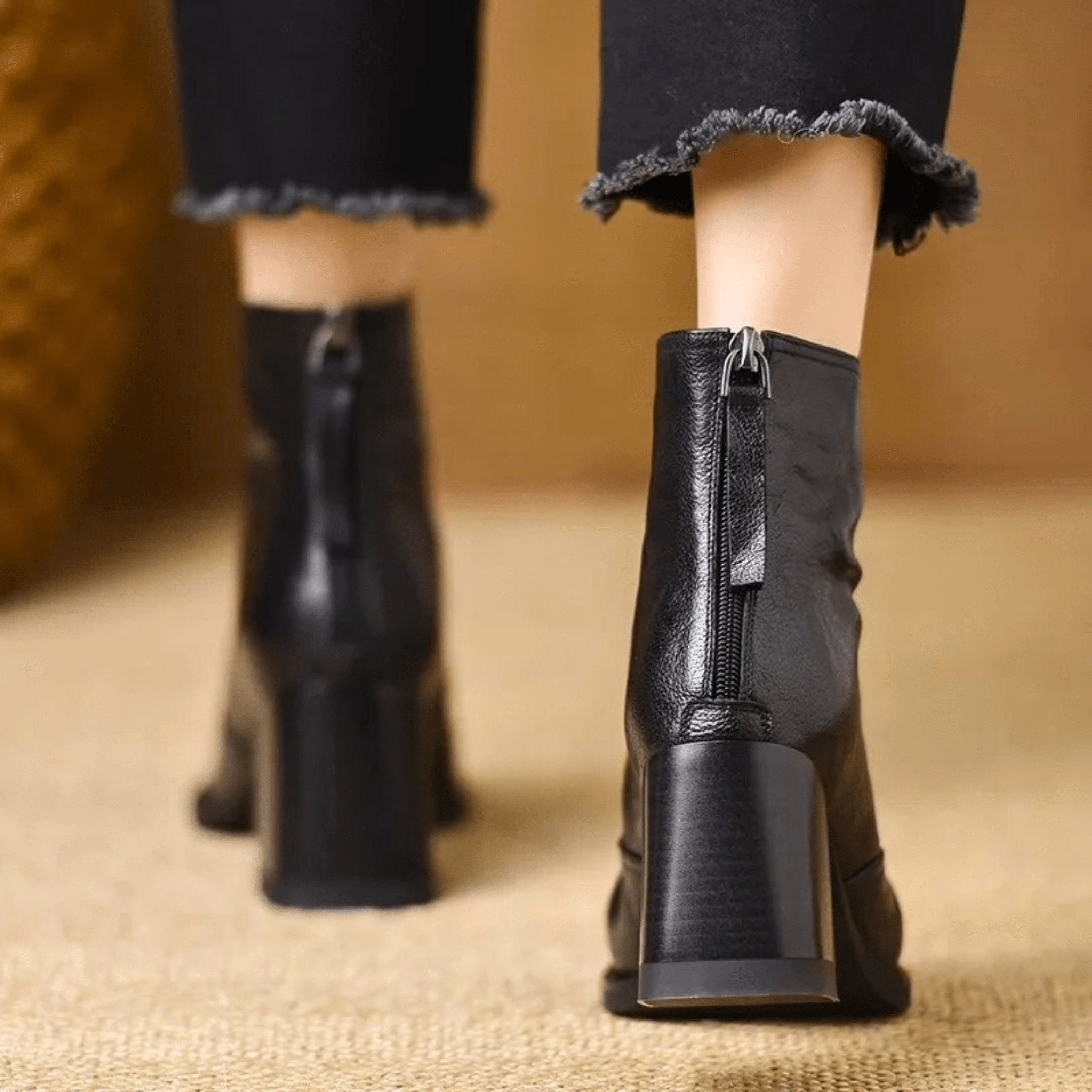 Sculpted heel ankle boots in espresso and midnight with a tailored ankle silhouette and back zip