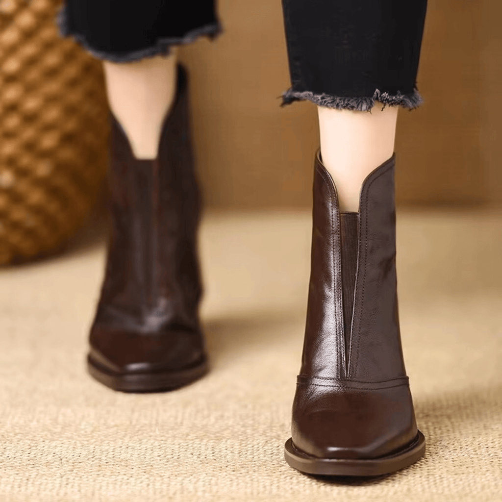 Sculpted heel ankle boots in espresso and midnight with a tailored ankle silhouette and back zip