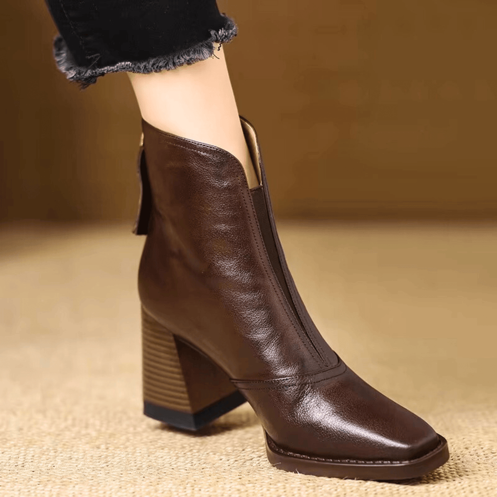Sculpted heel ankle boots in espresso and midnight with a tailored ankle silhouette and back zip
