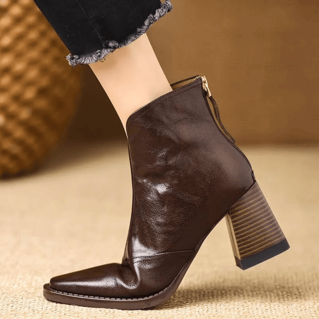 Sculpted heel ankle boots in espresso and midnight with a tailored ankle silhouette and back zip