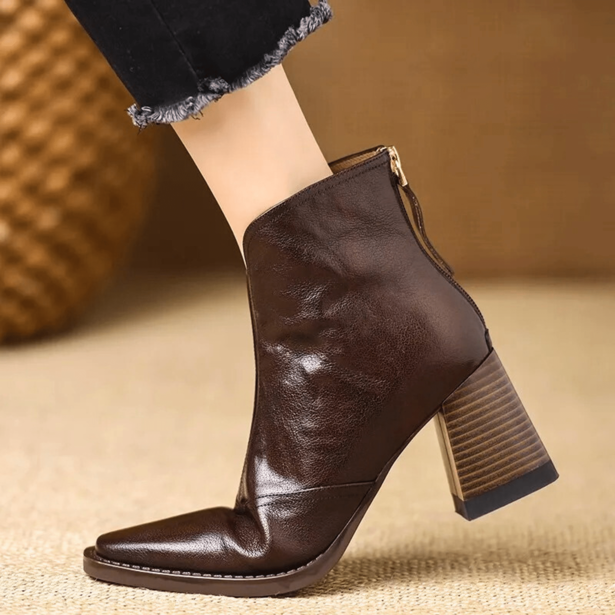 Sculpted heel ankle boots in espresso and midnight with a tailored ankle silhouette and back zip