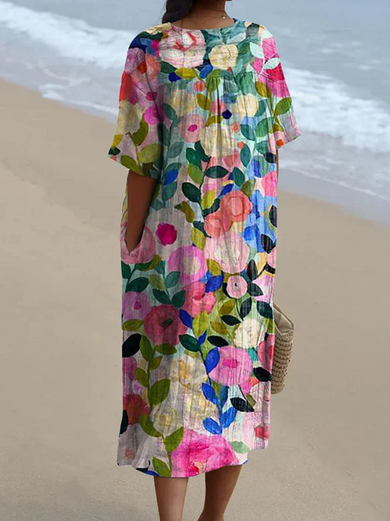 Bright floral print everyday dress with a relaxed silhouette and subtle back tie, shown in multiple print styles