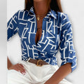 Classic collar blouse in a floral or geometric print with a clean, relaxed everyday shape