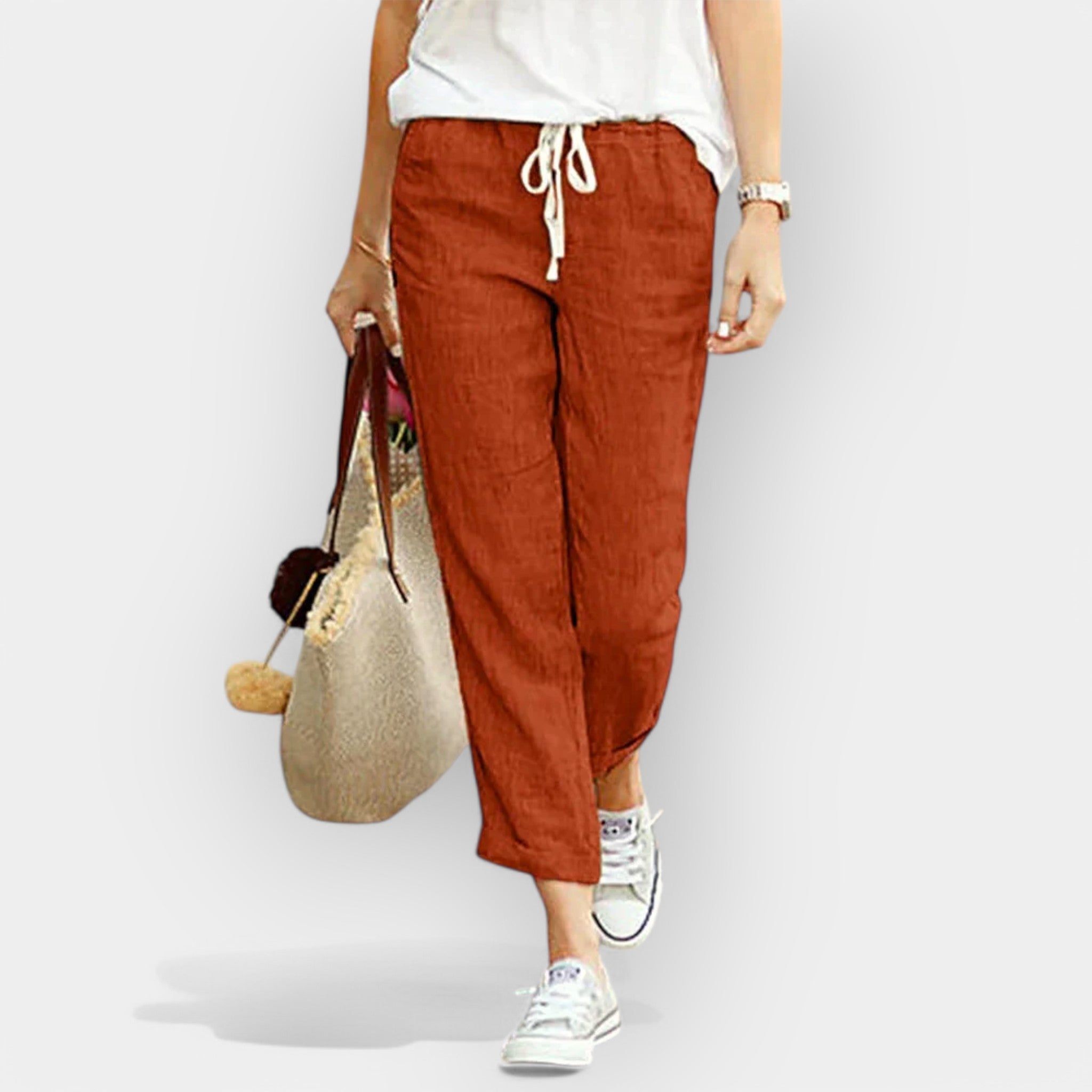 Women's wide-leg drawstring trousers in beige with a relaxed flowing silhouette