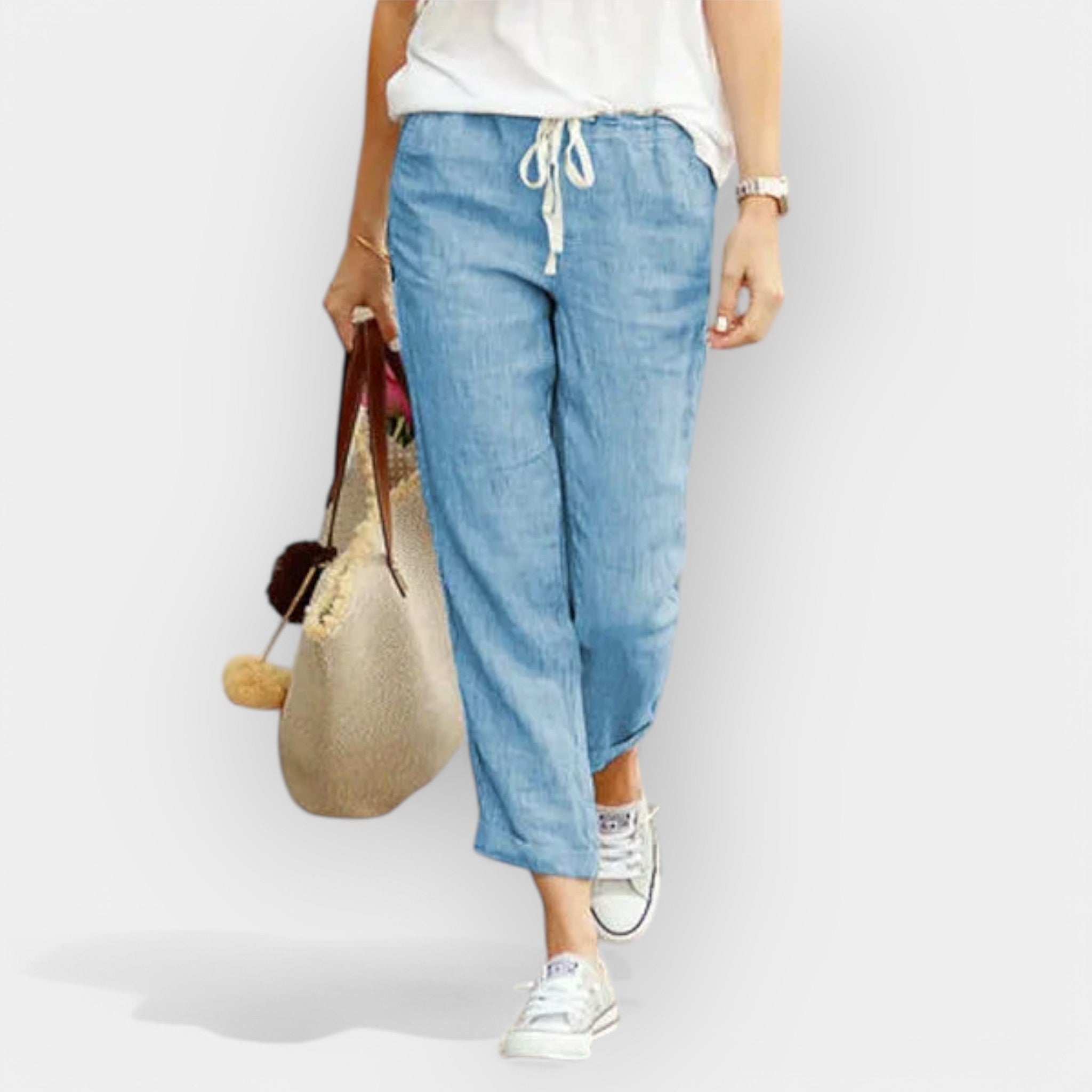 Women's wide-leg drawstring trousers in beige with a relaxed flowing silhouette