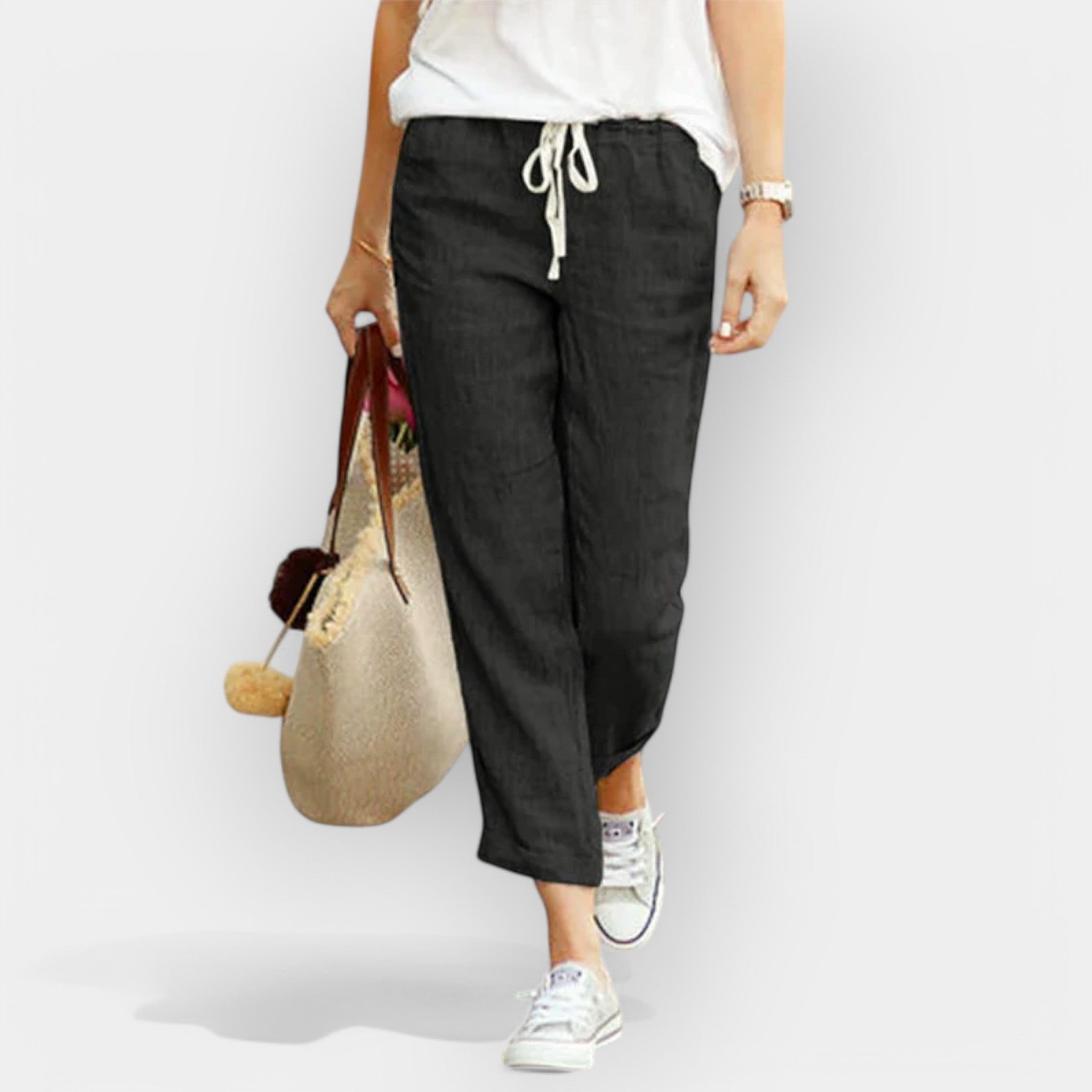 Women's wide-leg drawstring trousers in beige with a relaxed flowing silhouette