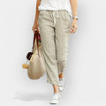 Women's wide-leg drawstring trousers in beige with a relaxed flowing silhouette