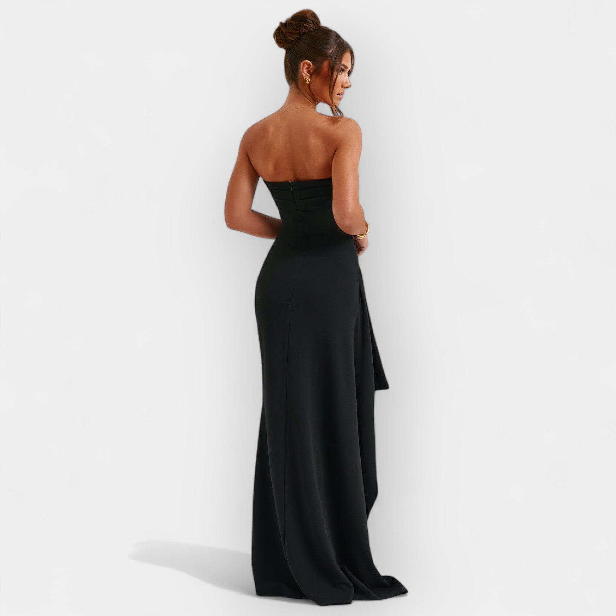 Women's minimalist long evening dress with a fluid drape and clean, elegant silhouette